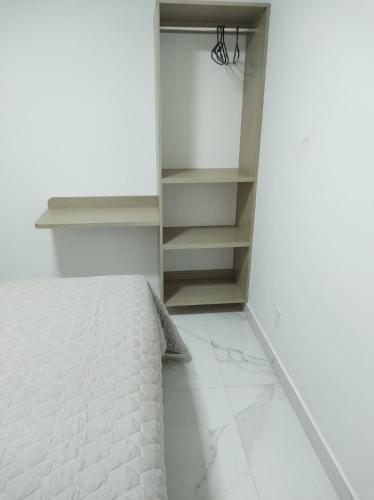 Säng eller sängar i ett rum på Apartamento Encantador Centro Santa Teresa