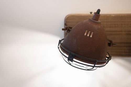 a brown hat sitting on a table next to a box at 248 Boutique Studios, Sliema in Sliema