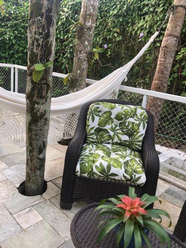 Гостиная зона в Guest House Guarujá Hotel Boutique