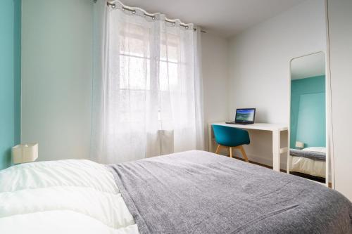 En eller flere senger på et rom på Ilbetea - Duplex tout confort - Plage à 400 m - Parking - Wifi