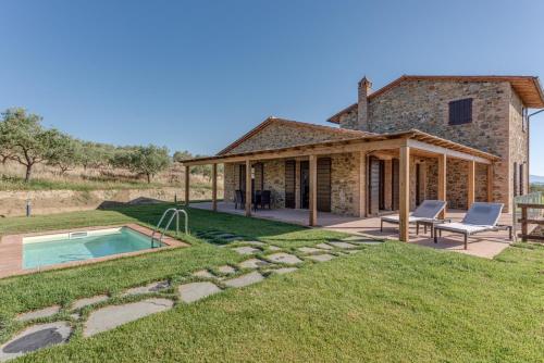 an image of a house with a swimming pool at Terra Antica - Resort, Winery & SPA in Montepulciano