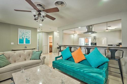 a living room with a couch and a table at Las Vegas Getaway with Patio about 3 Mi to Strip! in Las Vegas