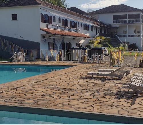 The swimming pool at or close to HOTEL SACRA FAMILIA -15 Km da Terra dos Dinos