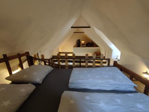 Llit o llits en una habitació de House "Ranná Rosa" - Holidayfarm Natural Slovakia