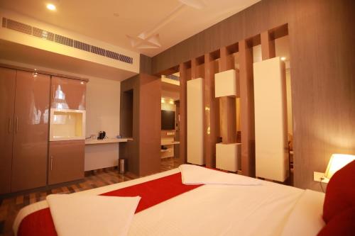 Cama o camas de una habitación en Sree Bharat Residency