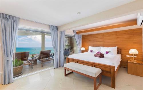 Postel nebo postele na pokoji v ubytování Beachfront Kalim Beach Villa