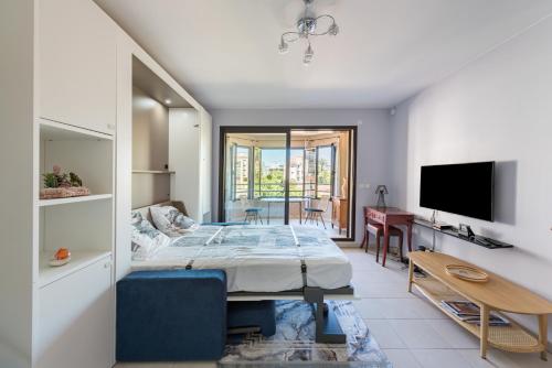 Postel nebo postele na pokoji v ubytování Beau Studio Véranda à deux pas de la mer - parking inclus