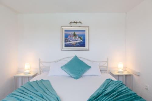 Een bed of bedden in een kamer bij Vila Blanka Apartments