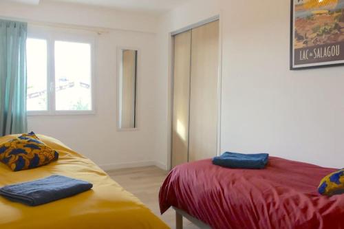 Кровать или кровати в номере Néo Cévenols Hostel