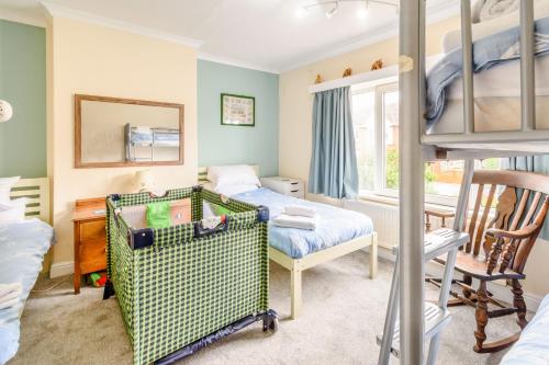 Postel nebo postele na pokoji v ubytování The Perks