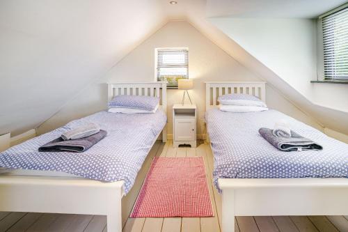 Postel nebo postele na pokoji v ubytování Brewery Cottage