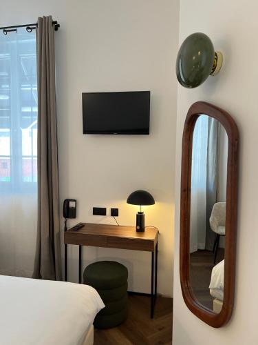 Кровать или кровати в номере Hôtel des Beaux Arts
