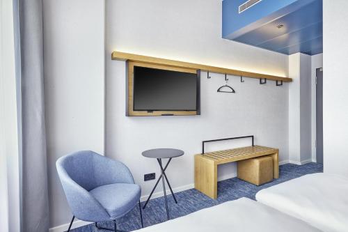 Et tv og/eller underholdning på H2 Hotel Düsseldorf Seestern
