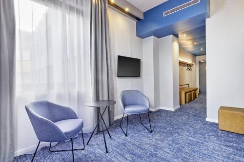 Et tv og/eller underholdning på H2 Hotel Düsseldorf Seestern