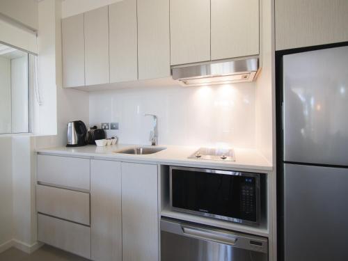 Una cocina o cocineta en Oaks Sunshine Coast Oasis Resort