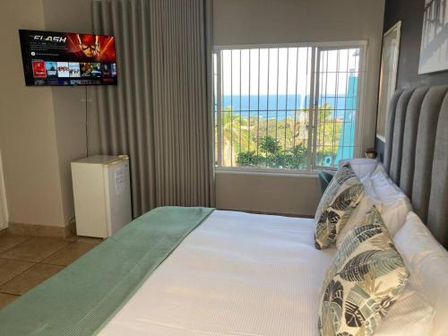 Łóżko lub łóżka w pokoju w obiekcie Ocean Rocks Villa, Umhlanga