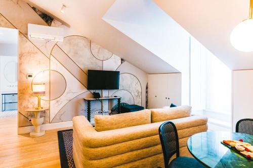 Телевизор и/или развлекательный центр в The Lift Apartments by RIDAN Hotels