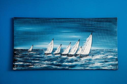 a painting of a group of sailboats in the ocean at Domus Enea in Taormina