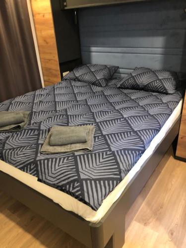 A bed or beds in a room at Luxury Mobile Houses Adria