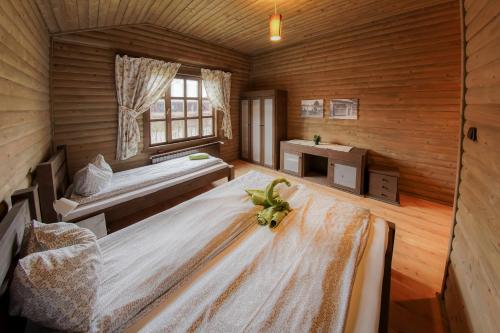Ein Bett oder Betten in einem Zimmer der Unterkunft Desag Resort