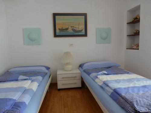 Ein Bett oder Betten in einem Zimmer der Unterkunft Casa Chatelain