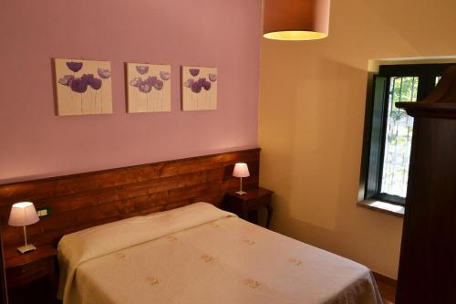 Katil atau katil-katil dalam bilik di Agriturismo Frangivento