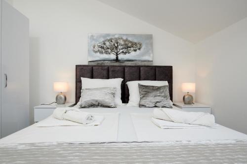 Posteľ alebo postele v izbe v ubytovaní Fratelli apartments