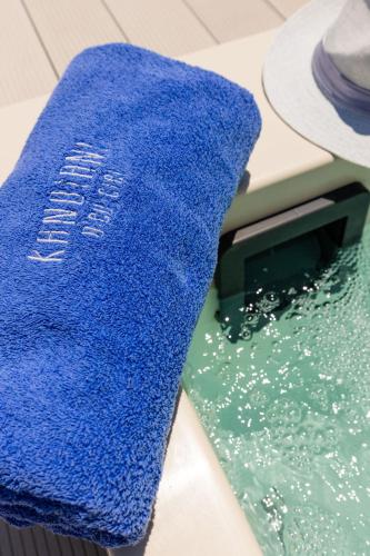 a blue towel sitting on top of a machine at Kandiani Bleu Ciel in Naousa