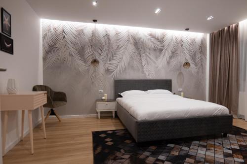 Llit o llits en una habitació de Garsoniera Lux Bd. Decebal