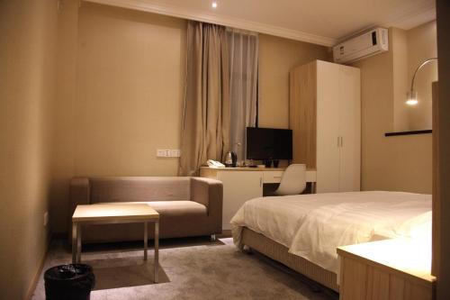 Posteľ alebo postele v izbe v ubytovaní Shanghai Fish Inn East Nanjing Road