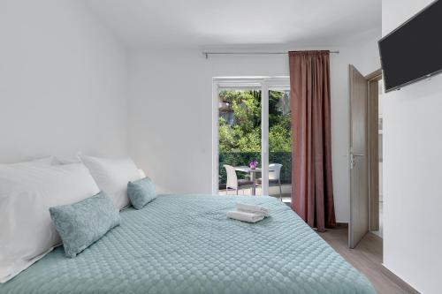 Posteľ alebo postele v izbe v ubytovaní Central Makarska - Apartments Šantrić