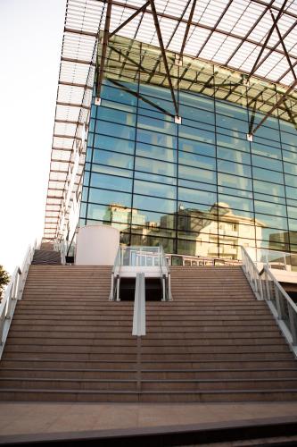 a set of stairs with a table in front of a building at Hotel Cristallo in Riccione