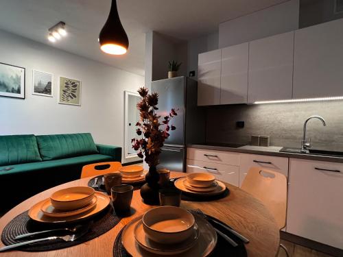 Η κουζίνα ή μικρή κουζίνα στο Apartament DELUX ROZTOCZE