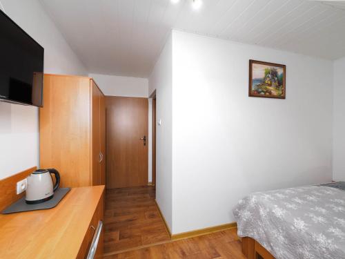 Postel nebo postele na pokoji v ubytování Astoria