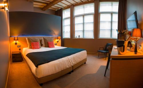 Postel nebo postele na pokoji v ubytování Hotel Neuvice