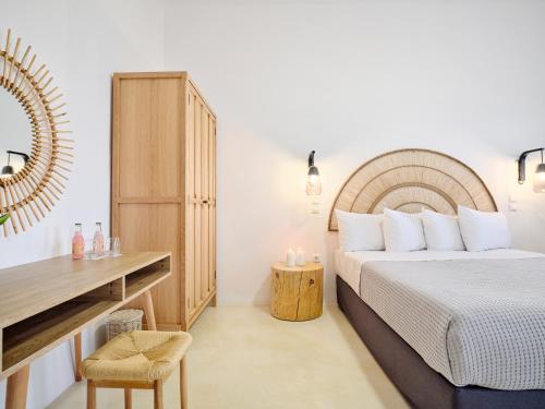 Postel nebo postele na pokoji v ubytování Bonatsa Beach House