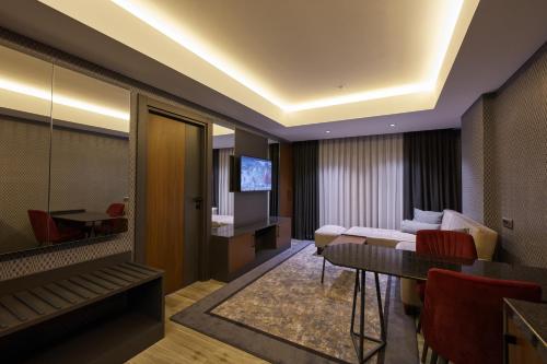 Χώρος καθιστικού στο Nova Vista Deluxe & Suites a Member of Radisson Individuals