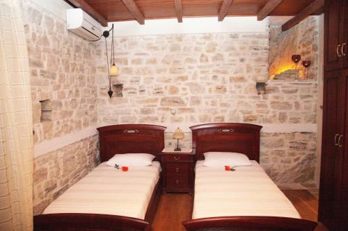 Кровать или кровати в номере Villa Votsalo
