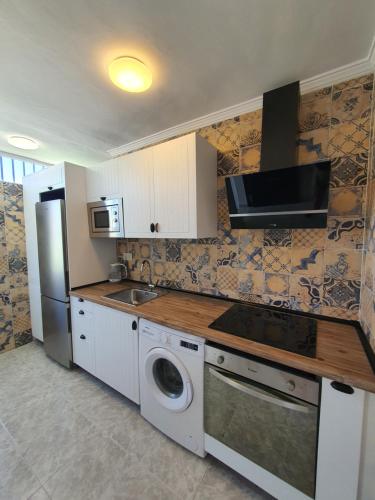 Kuchyň nebo kuchyňský kout v ubytování Aldea beach, manilva