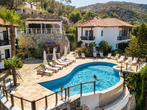 an image of a swimming pool at a villa at Les Terrasses De Selimiye in Selimiye