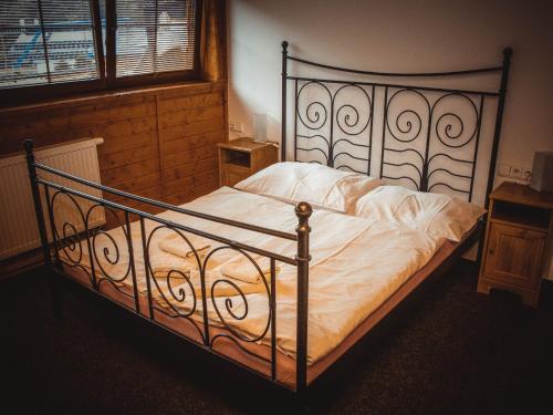 Postel nebo postele na pokoji v ubytování Penzion u Hajneho Bedricha