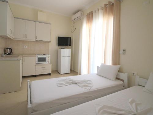 Fotografie z fotogalerie ubytování Sunset Apartments Berdenesh Sarandë v destinaci Sarandë