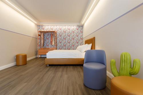 Ένα ή περισσότερα κρεβάτια σε δωμάτιο στο CASA FLORES Apartments