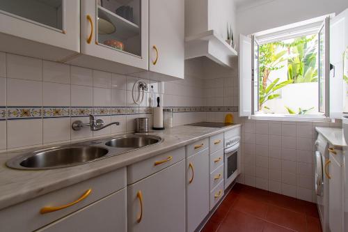 Guadiana River Apartment tesisinde mutfak veya mini mutfak