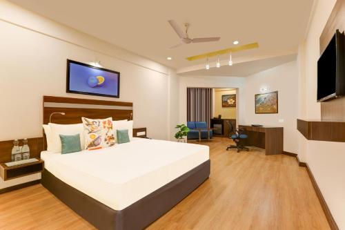 Μια τηλεόραση ή/και κέντρο ψυχαγωγίας στο Lemon Tree Hotel, Port Blair Near to Airport