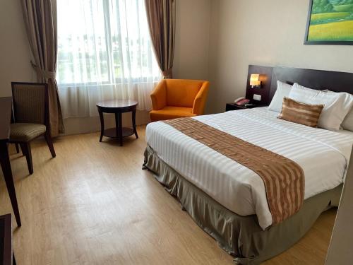 Cama o camas de una habitación en Asialink Premier hotel