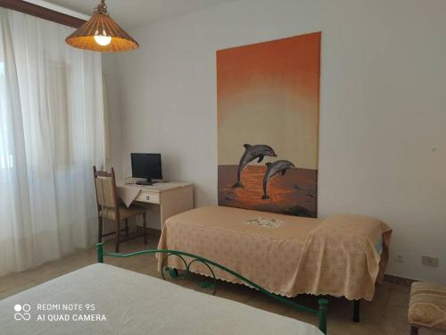 En eller flere senger på et rom på Villa Lucetta
