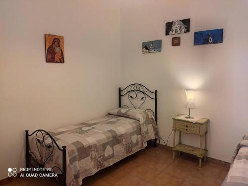 Ένα ή περισσότερα κρεβάτια σε δωμάτιο στο Villa Lucetta