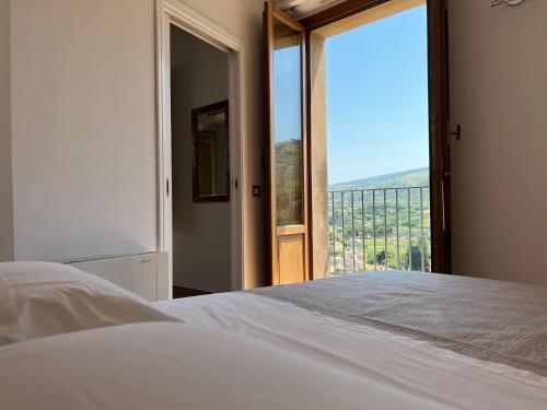 Letto o letti in una camera di La Rupe Apartments Tropea