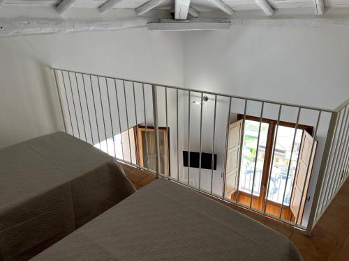 Letto o letti in una camera di La Rupe Apartments Tropea